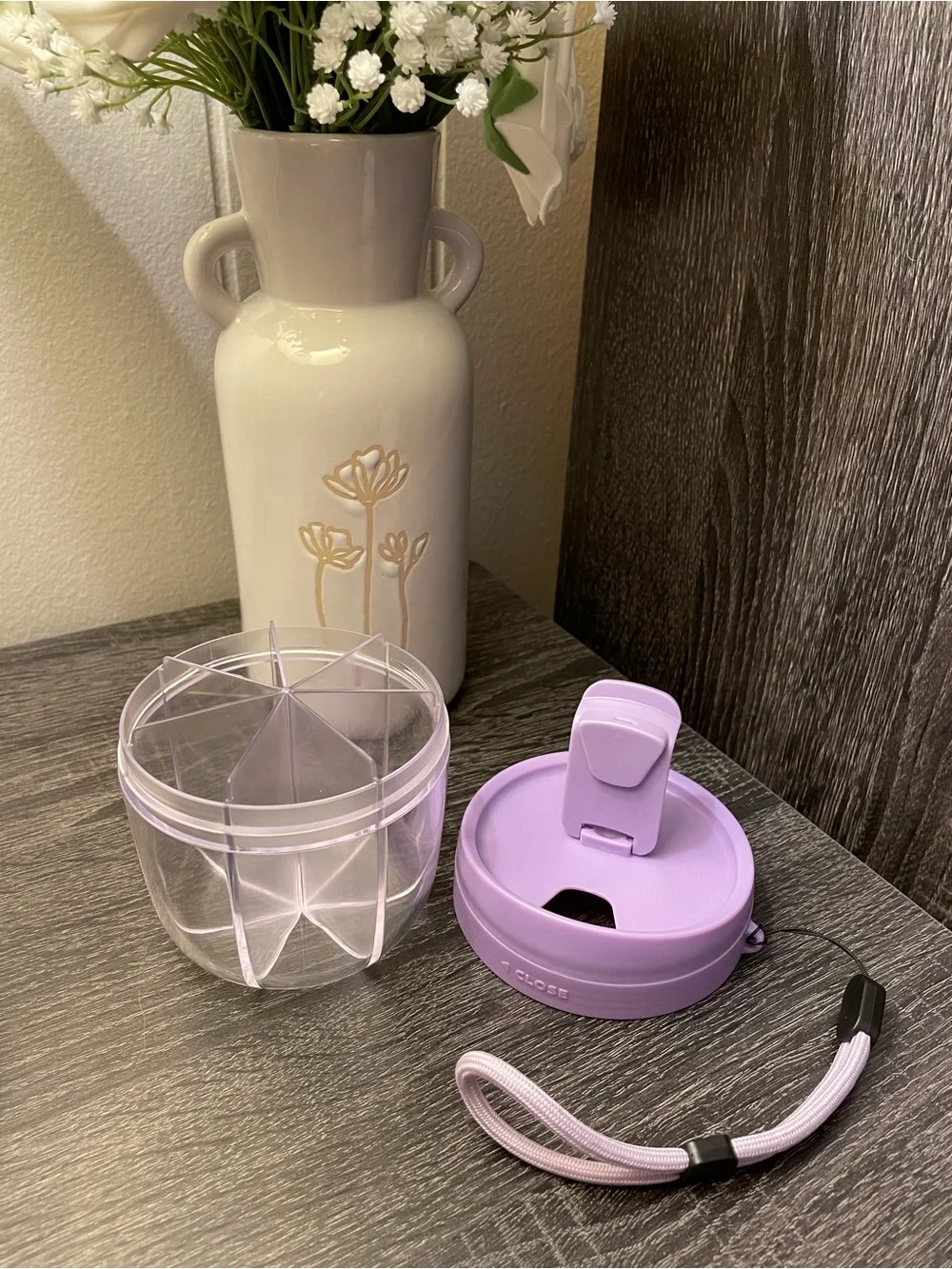 Purple daily pill box with twist lid